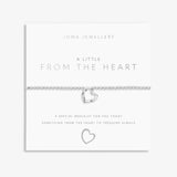 A silver beaded bracelet with a silver wavy heart on sentiment card