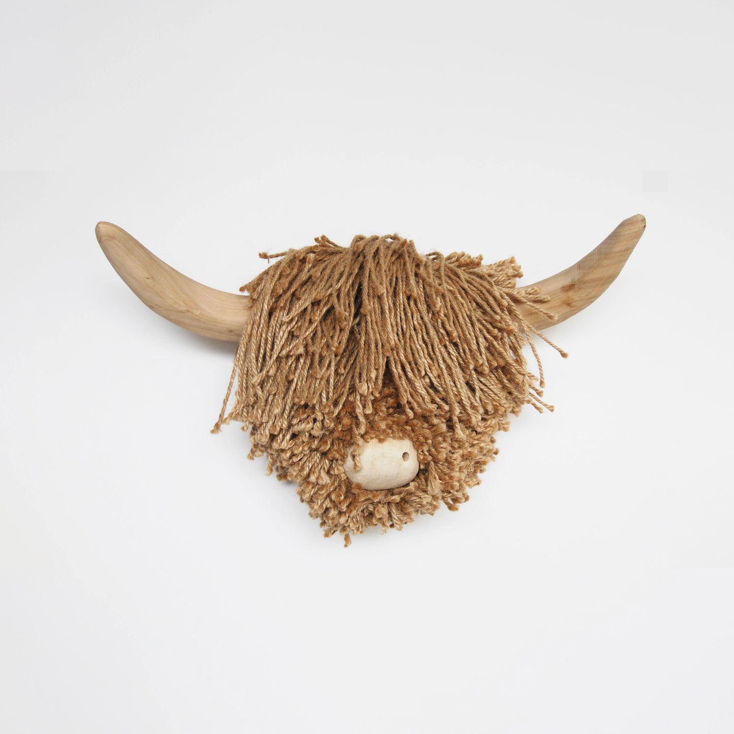 A natural jute twine wall mounted cow head