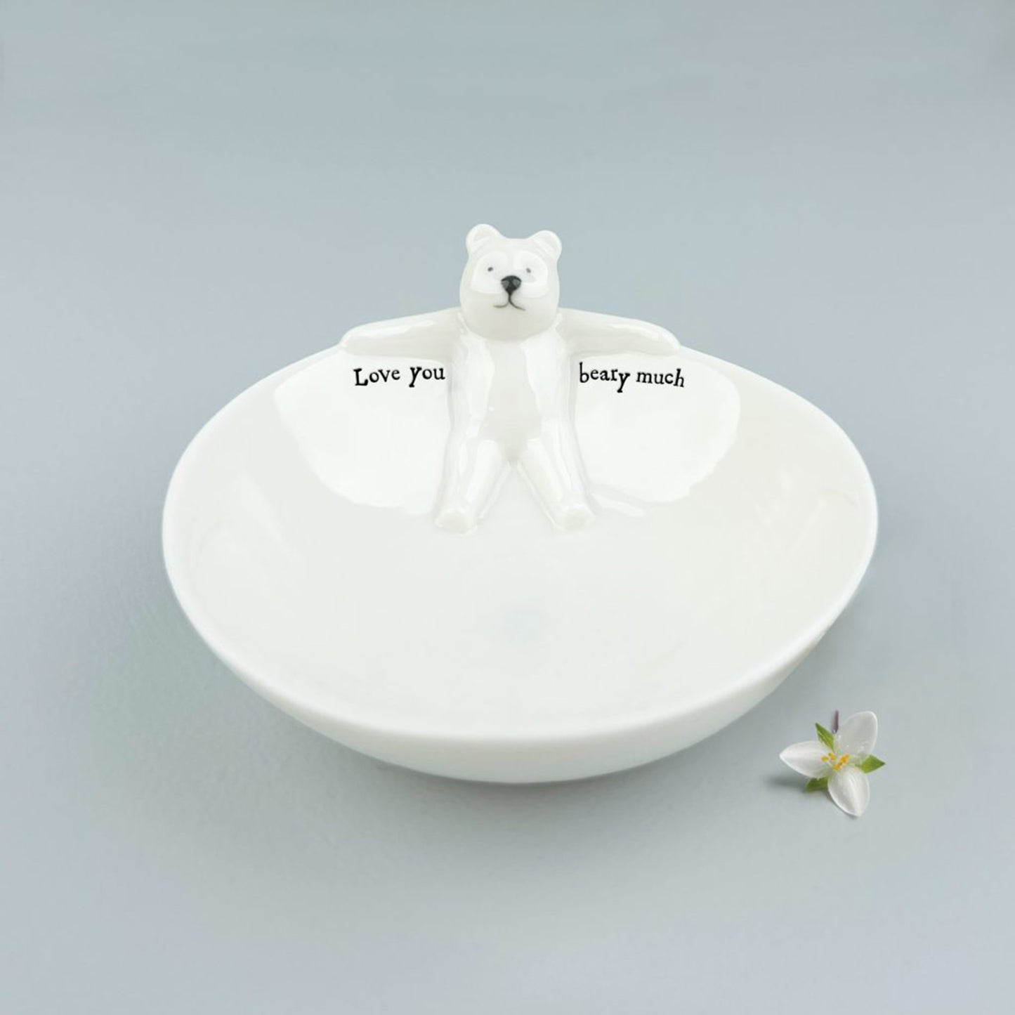 A white percaline trinket bowl with a little bear and the words 'love you beary much'