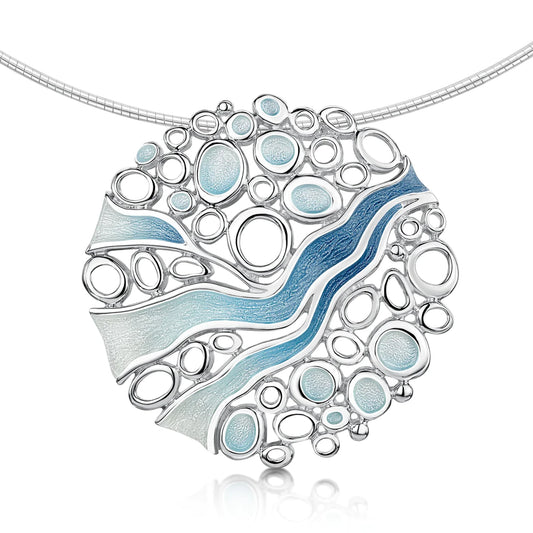 Silver Necklet on a wire with blue enamel shapes like water and round open silver circles to represent ice.
