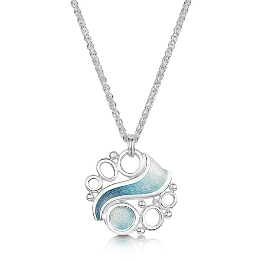 Silver round pendant with icy blue enamel in the centre like water and silver circles to represent floating glaciers