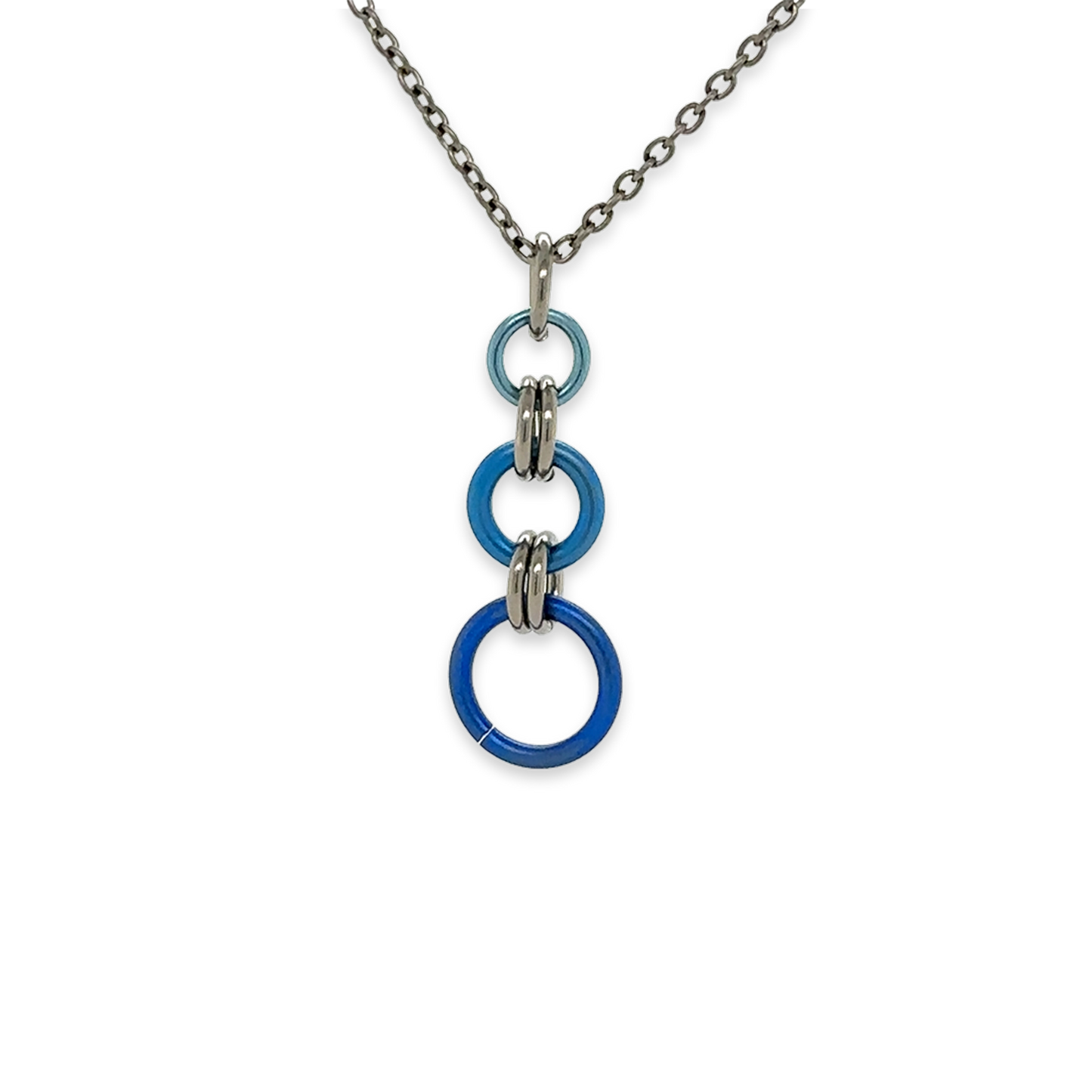 A pendant featuring 3 blue circles linked together by gunmetal coloured rings