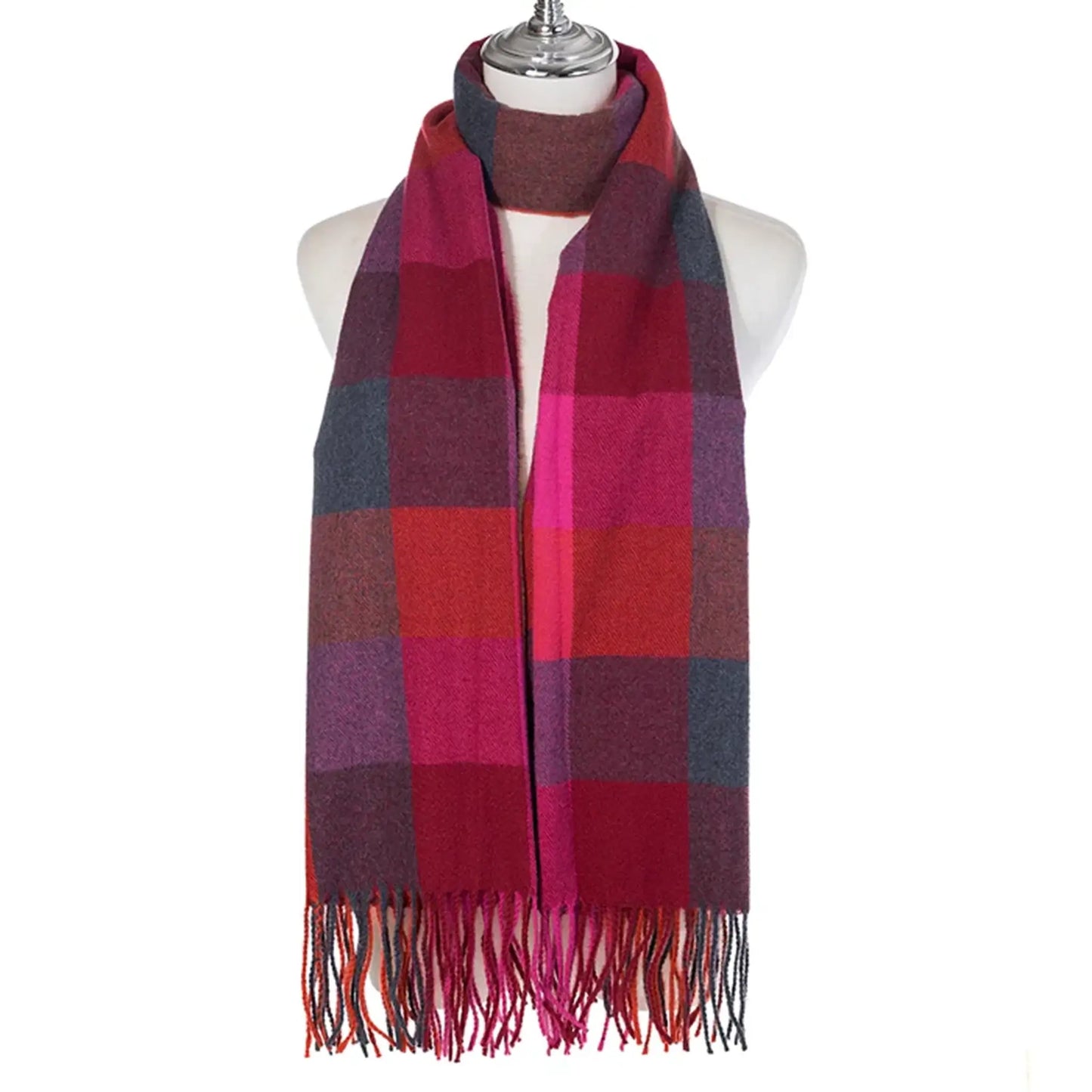 Block check patterned scarf in pink, purple and red colours with tassel trim