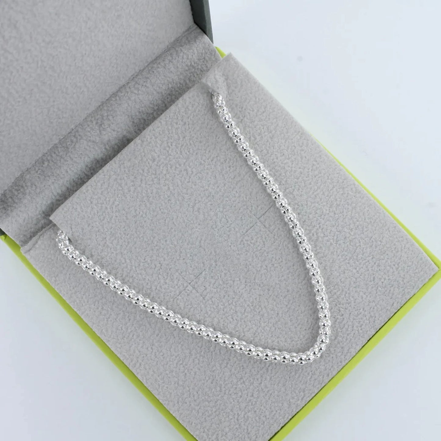 Silver chain necklace with 'bobble' style in box