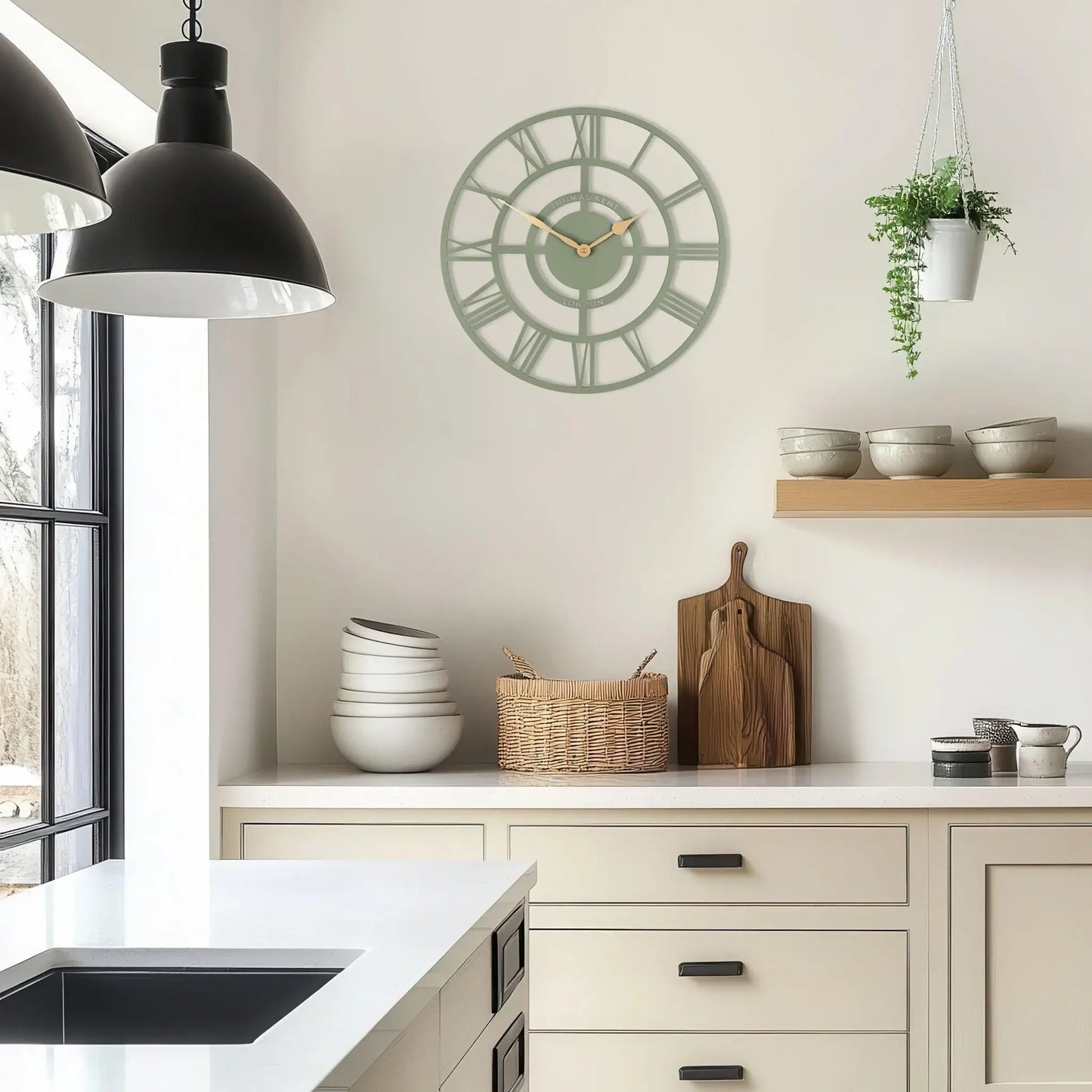 Skeleton wall clock in olive green with gold hands lifestyle