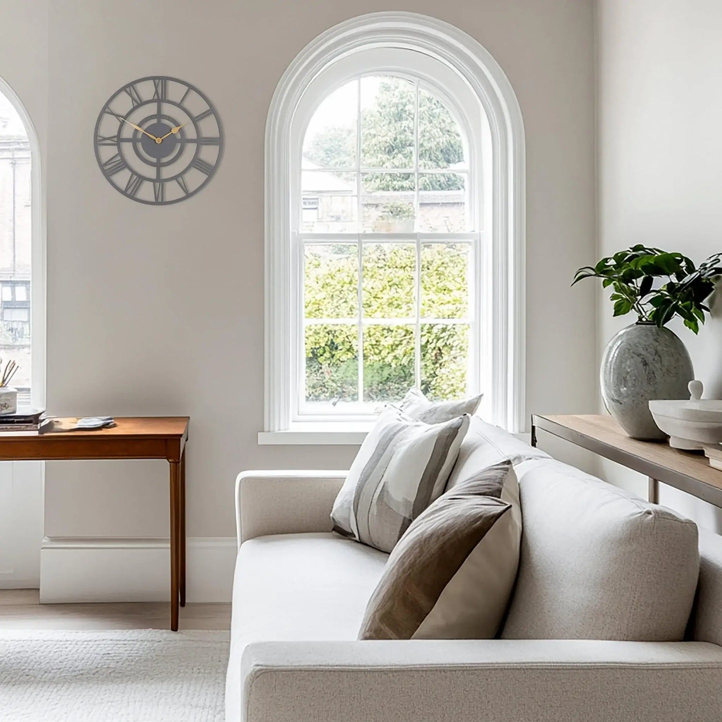 Skeleton wall clock in slate grey with gold hands lifestyle