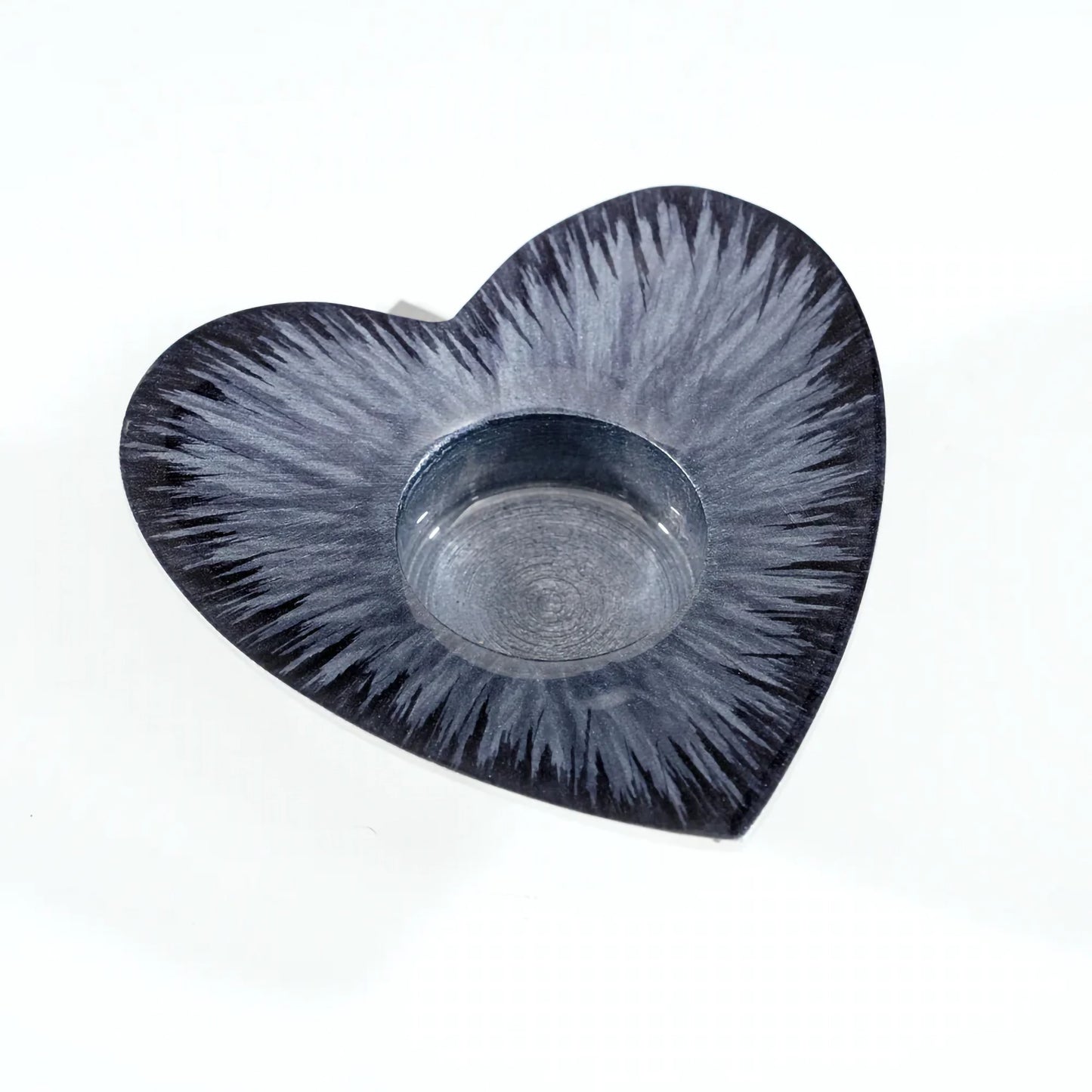 A black enamel decorated heart shaped t-light holder