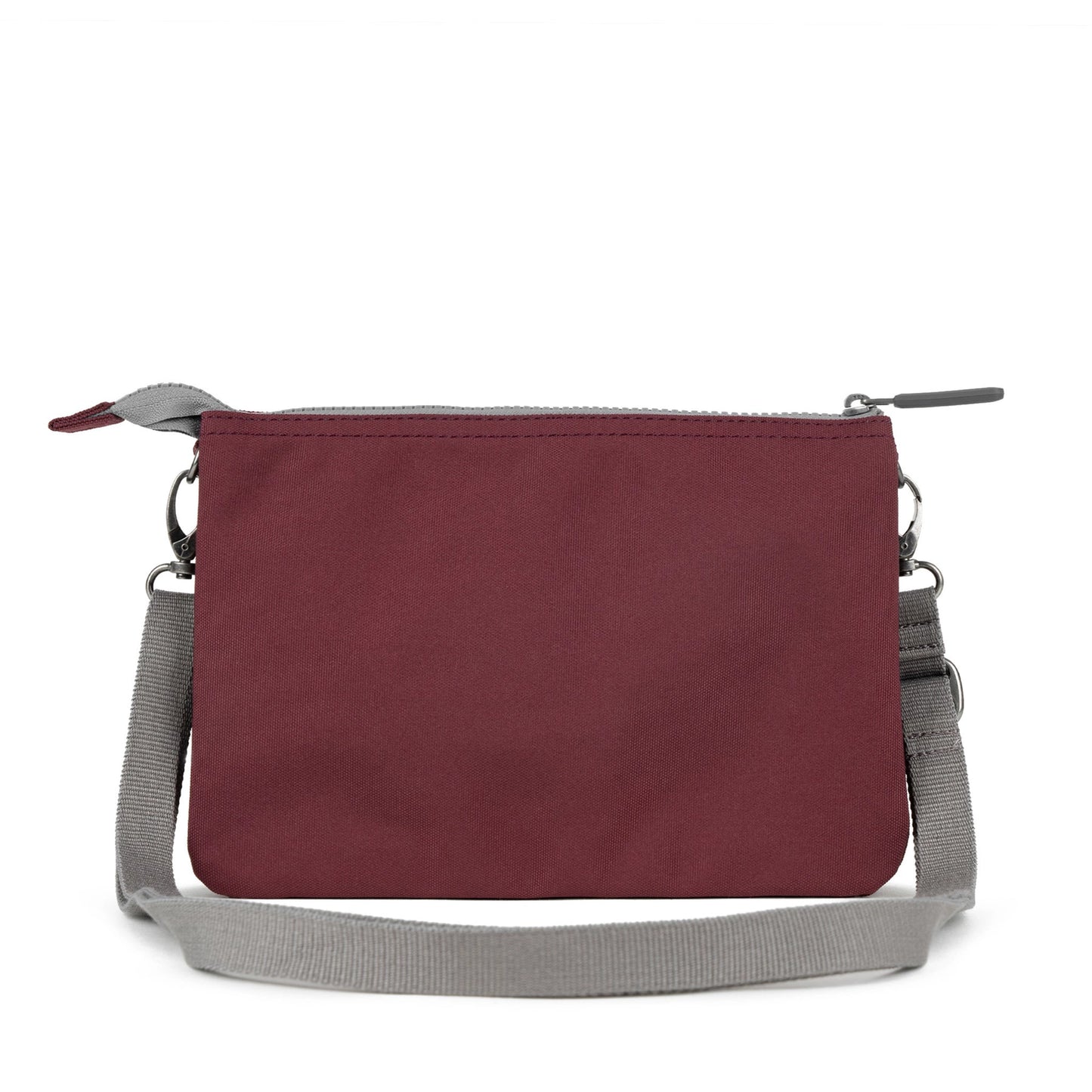 Back of canvas bag in a deep red colour with removable cross-body strap