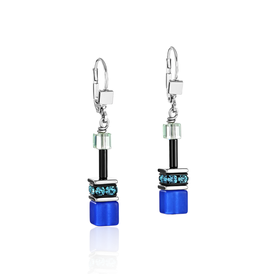 Earrings featuring blue cube shaped polaris stones with Swarovski crystals