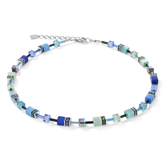 A necklet featuring a variety of cube shaped stones and Swarovski crystals in blue and green colours