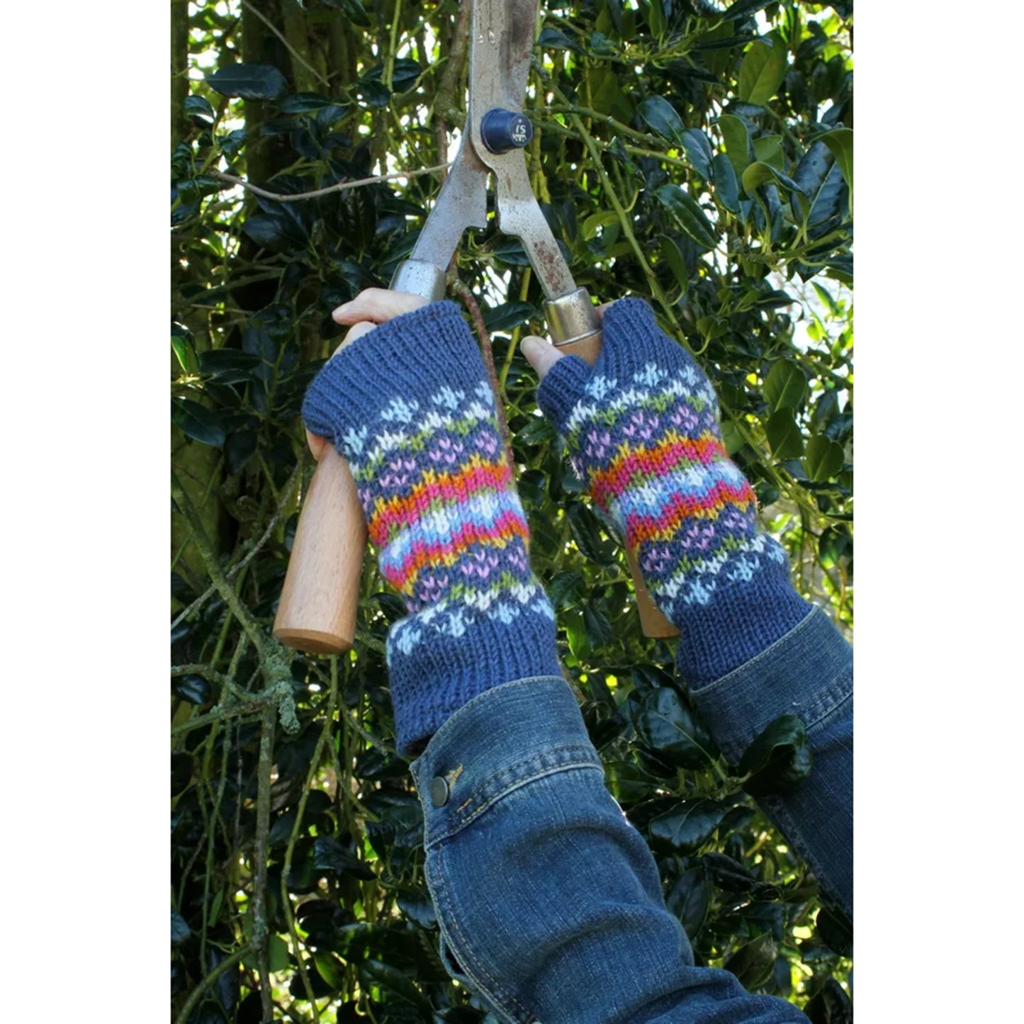 A pair of denim knitted wristwarmers with multicolour stripe pattern
