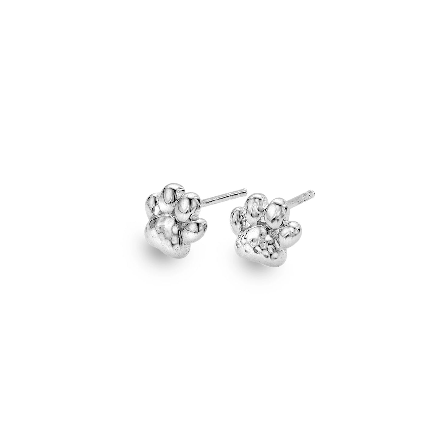 Silver stud earrings shaped like dog paw prints with a hammered texture