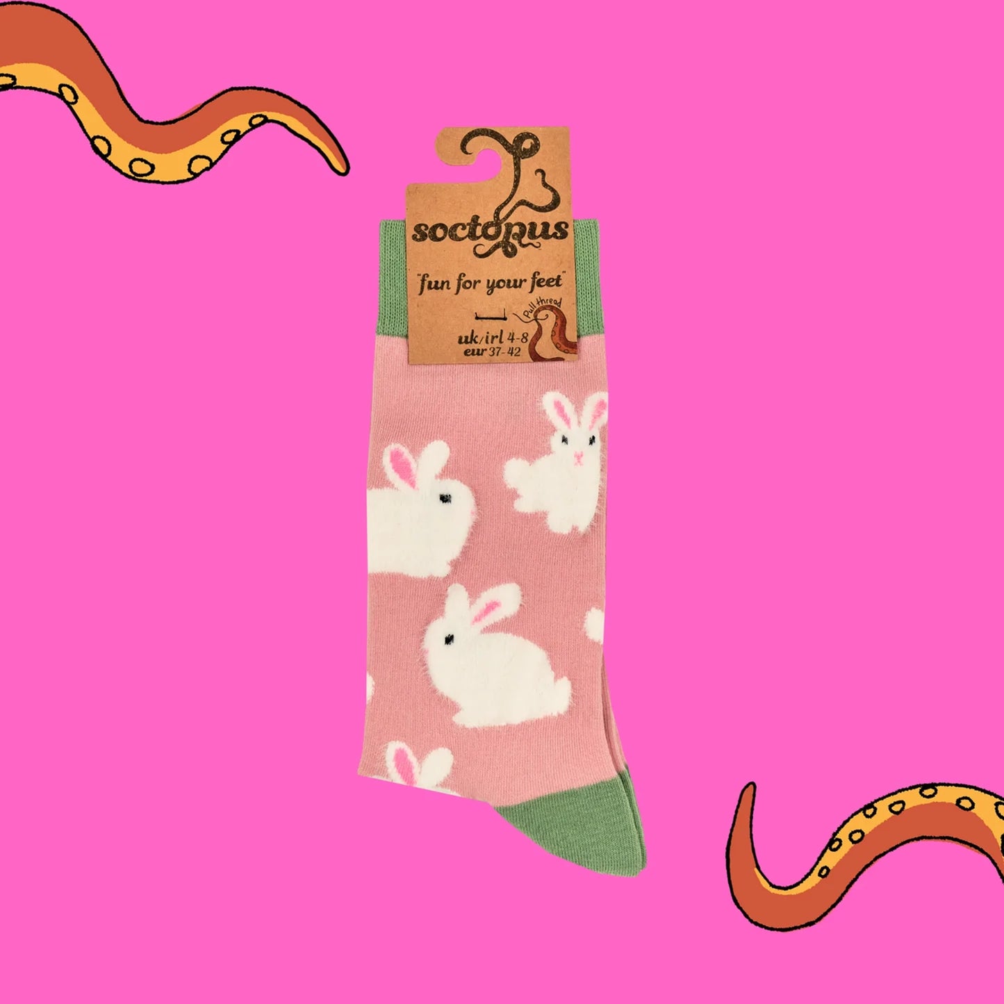 Pair of pink and green tufted white fluffy bunny rabbit socks