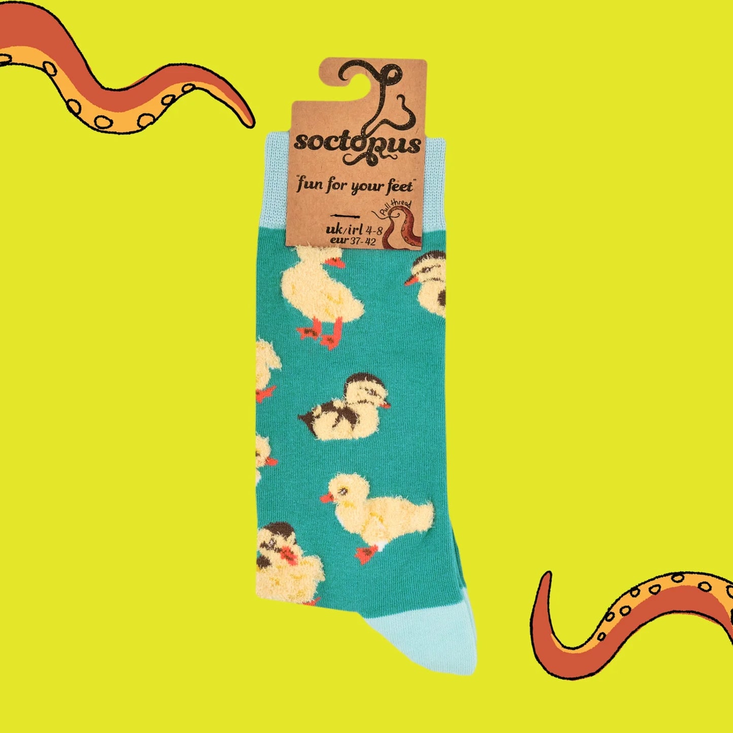 Pair of green tufted yellow fluffy duckling socks