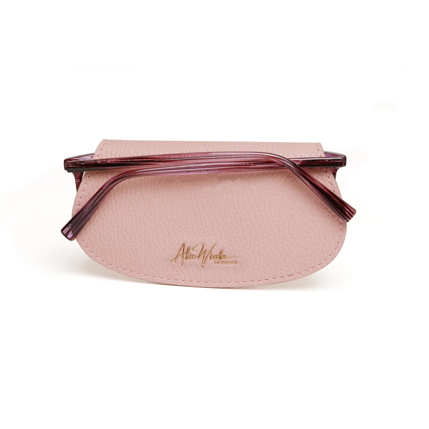 Faux leather pink coloured glasses case with glasses inside and Alice Wheeler logo in gold
