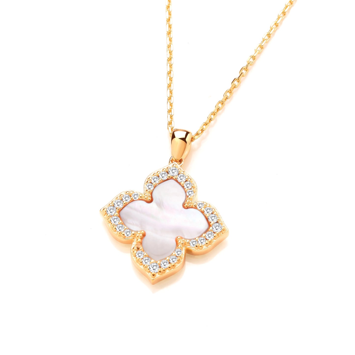 A gold clover necklace with CZ stones and pink mother of pearl centre