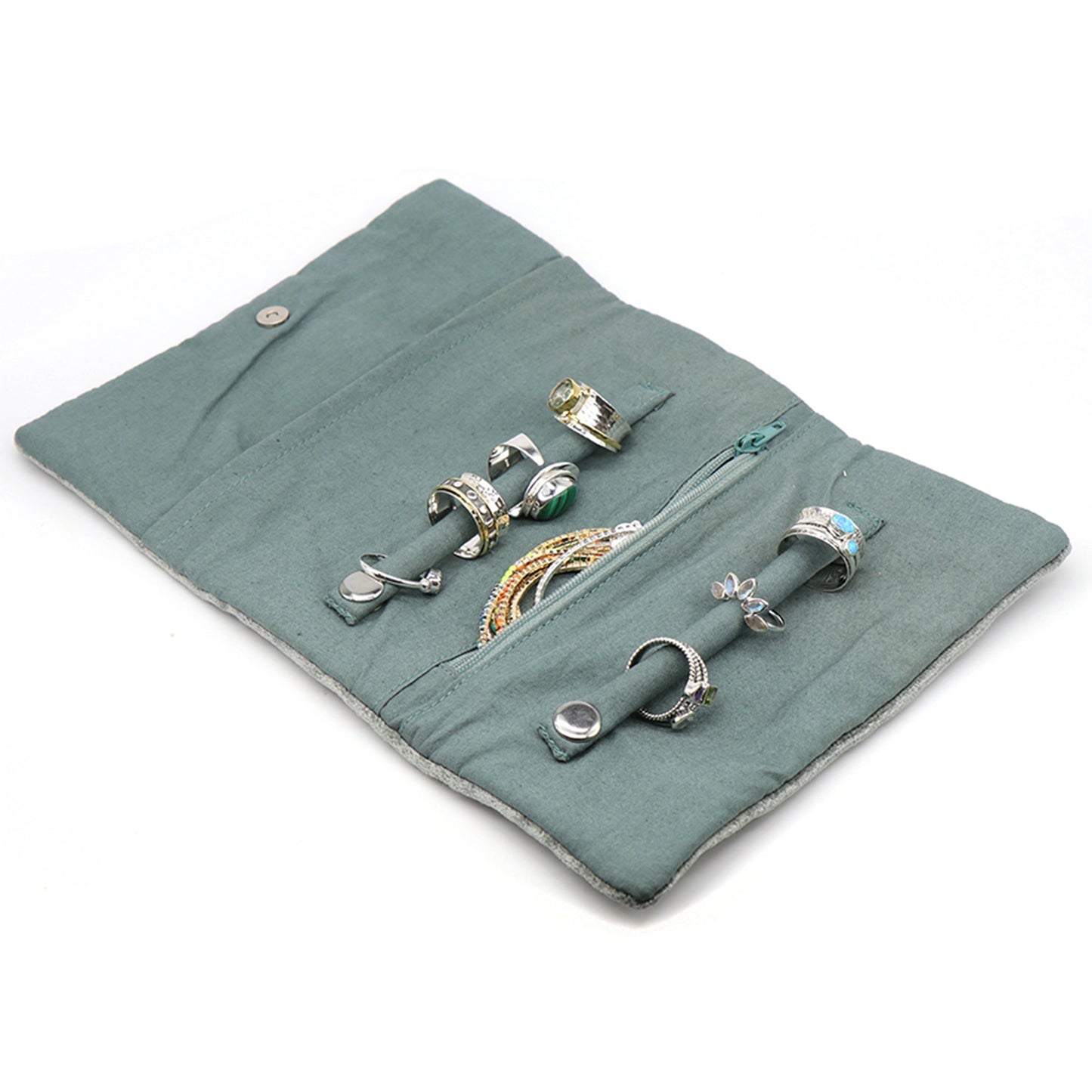 Open seafoam green velvet jewellery roll with two snap ring rolls and a zip pocket