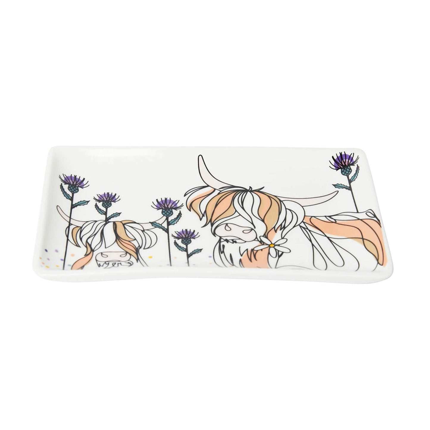 A rectangular trinket dish with Highland cow and thistle print