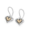 Pair of silver earrings in illustrative heart shapes  with golden heart centres and hook fittings