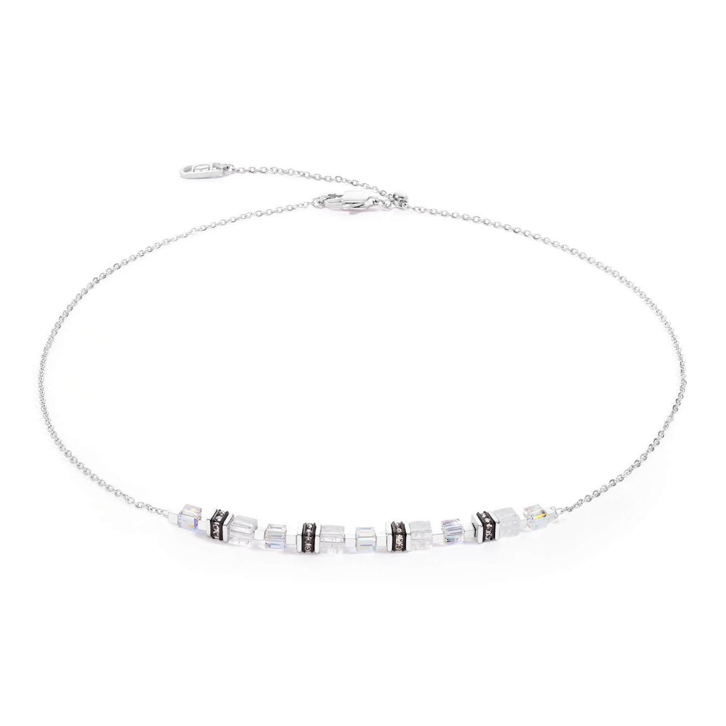 A silver chain necklace with white cube shaped stones