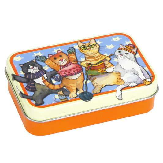 A small hinged top tin featuring an illustration of cats in jumpers and mittens