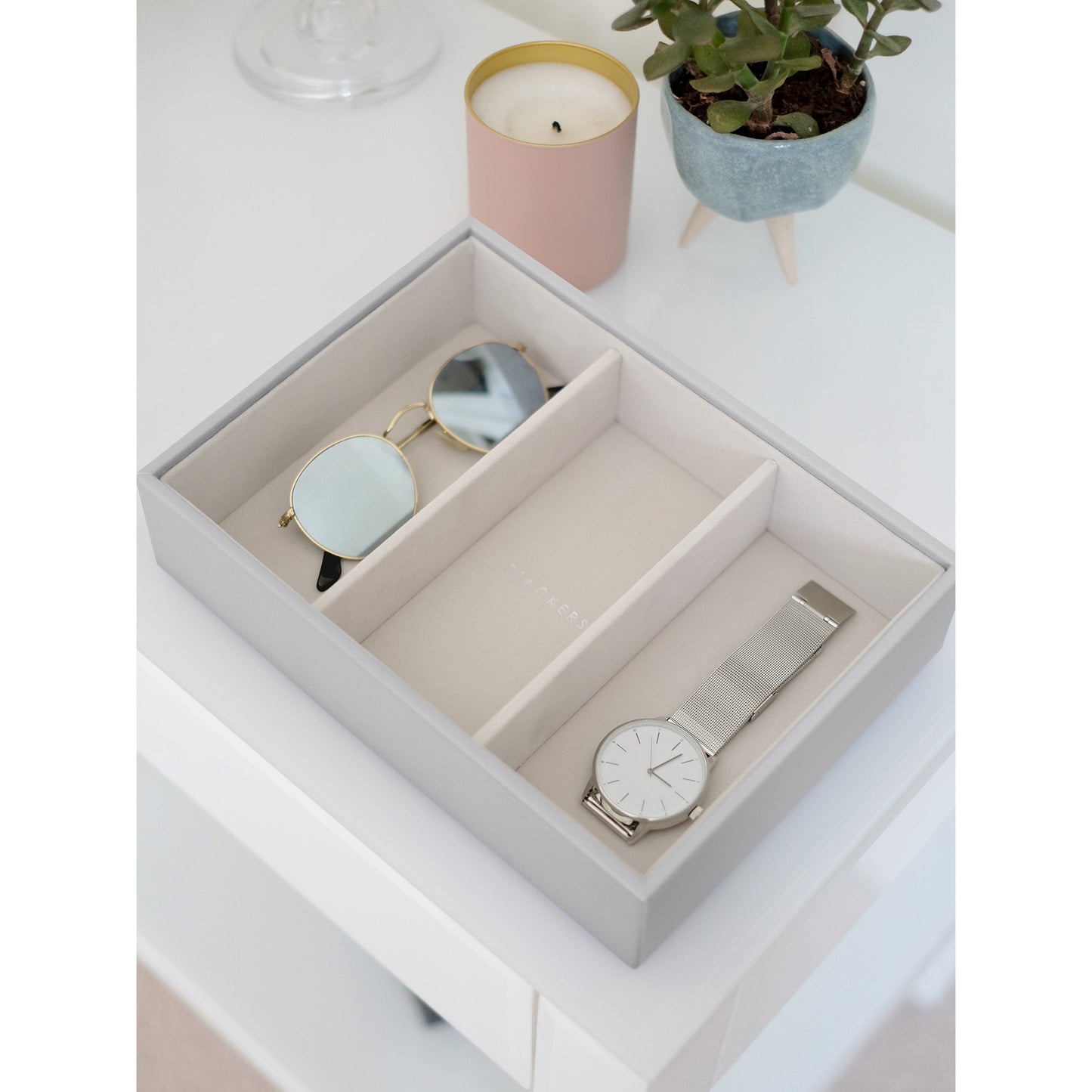 A stackable grey faux leather jewellery box watch and bracelet layer - lifestyle