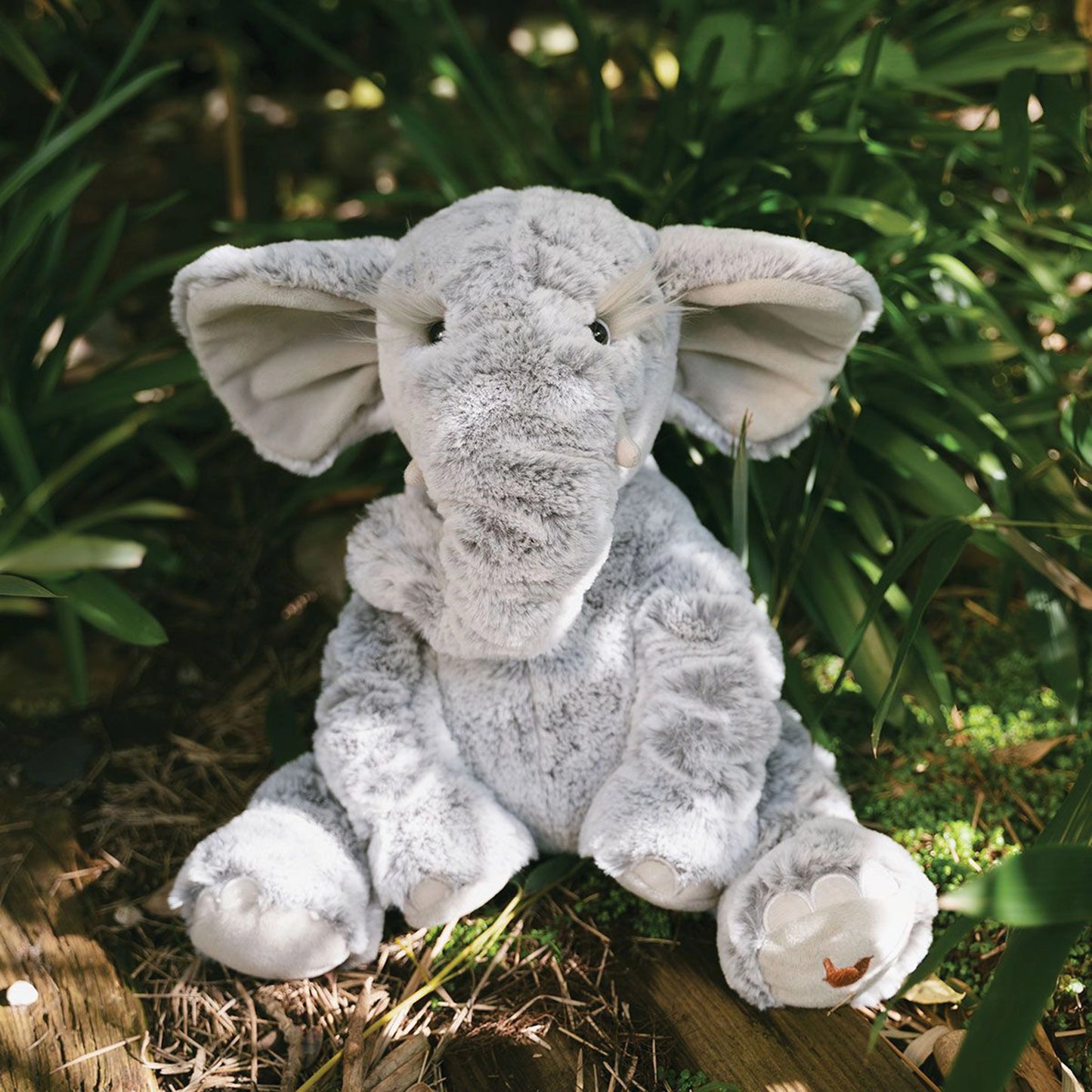 Stuffed elephant plush toy with the Wrendale emblem embroidered on its foot lifestyle