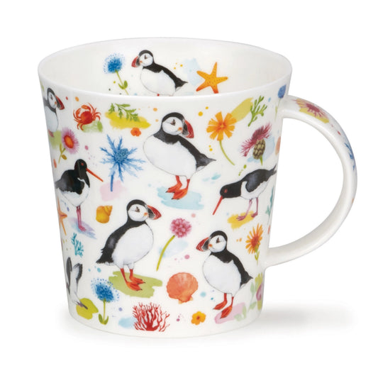 A white mug featuring a multicolour design of birds, sea creatures and flowers