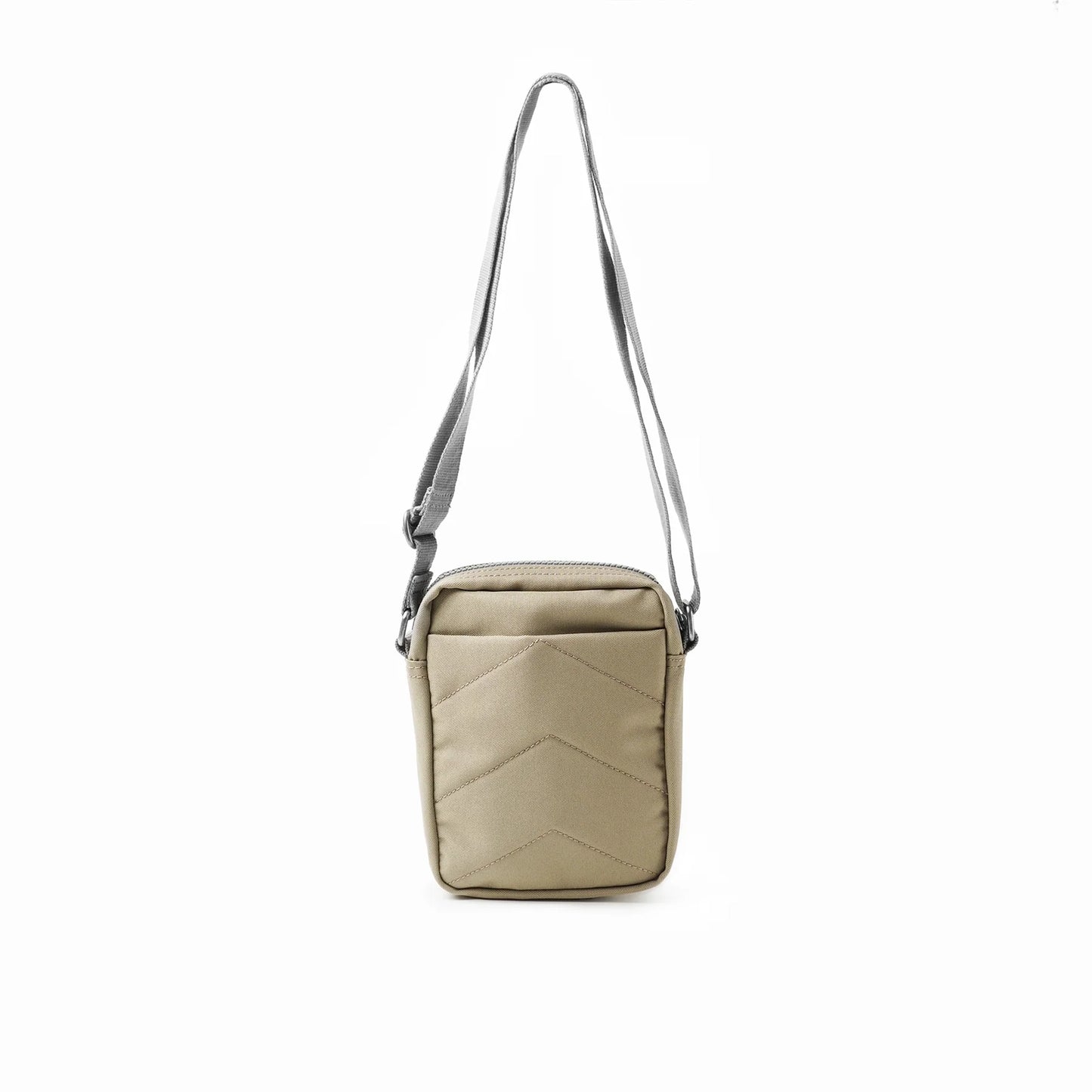 Reverse of a small crossbody bag in canvas material and a khaki beige colour