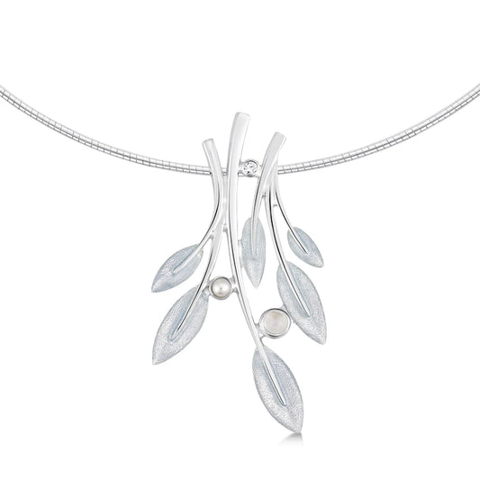 Large silver necklet with a rowan tree leaf design, a pearl and moonstone in frosty white enamel on a silver neck wire