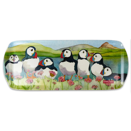 A long sandwich tray featuring a watercolour illustration of Puffins by a loch