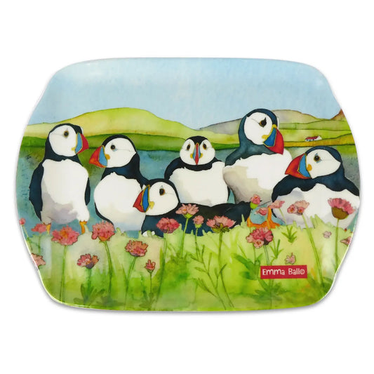 A scatter tray featuring a watercolour artwork of Puffins on a landscape background