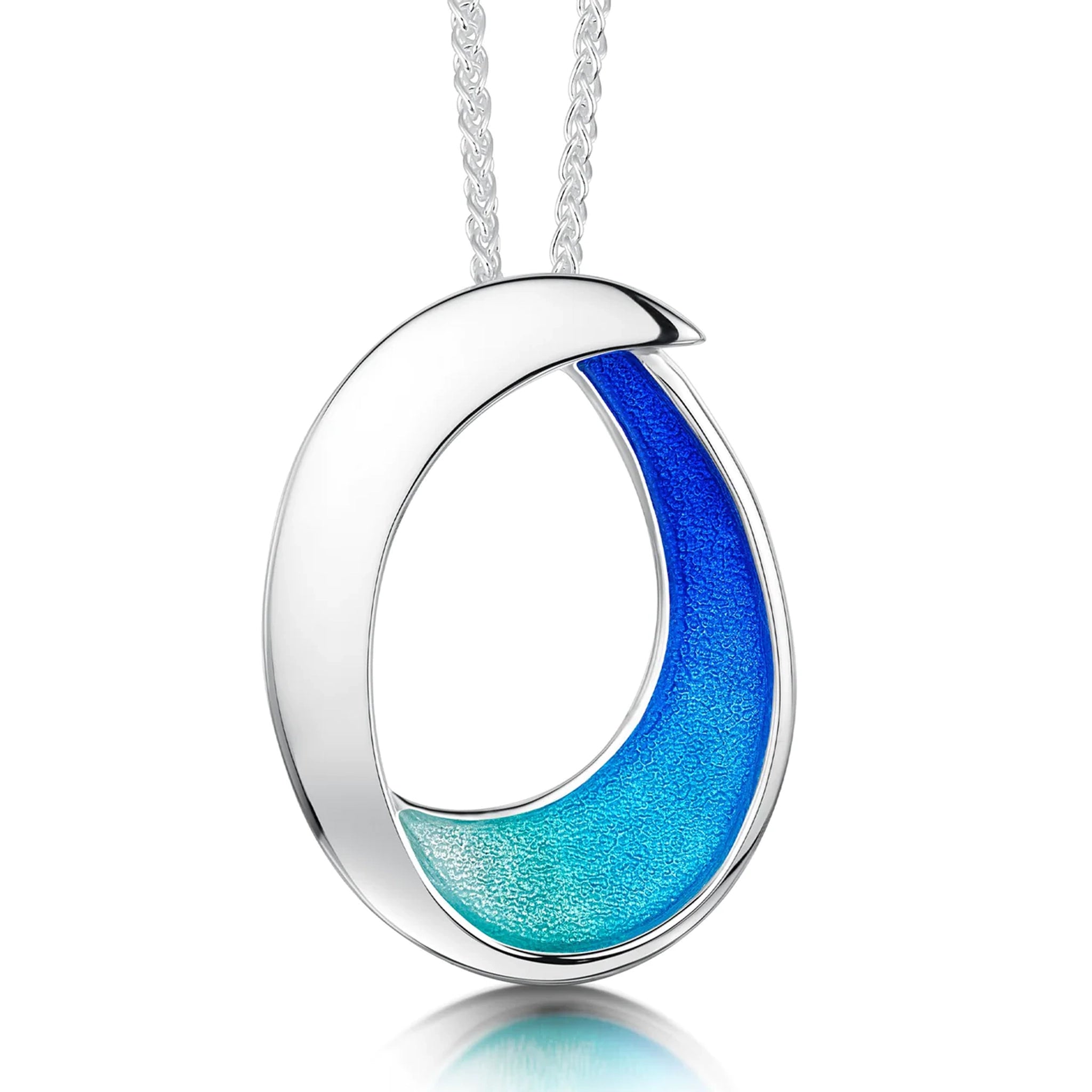 Large silver pendant with bright blue enamel in a simple abstract ocean wave shape on a silver chain