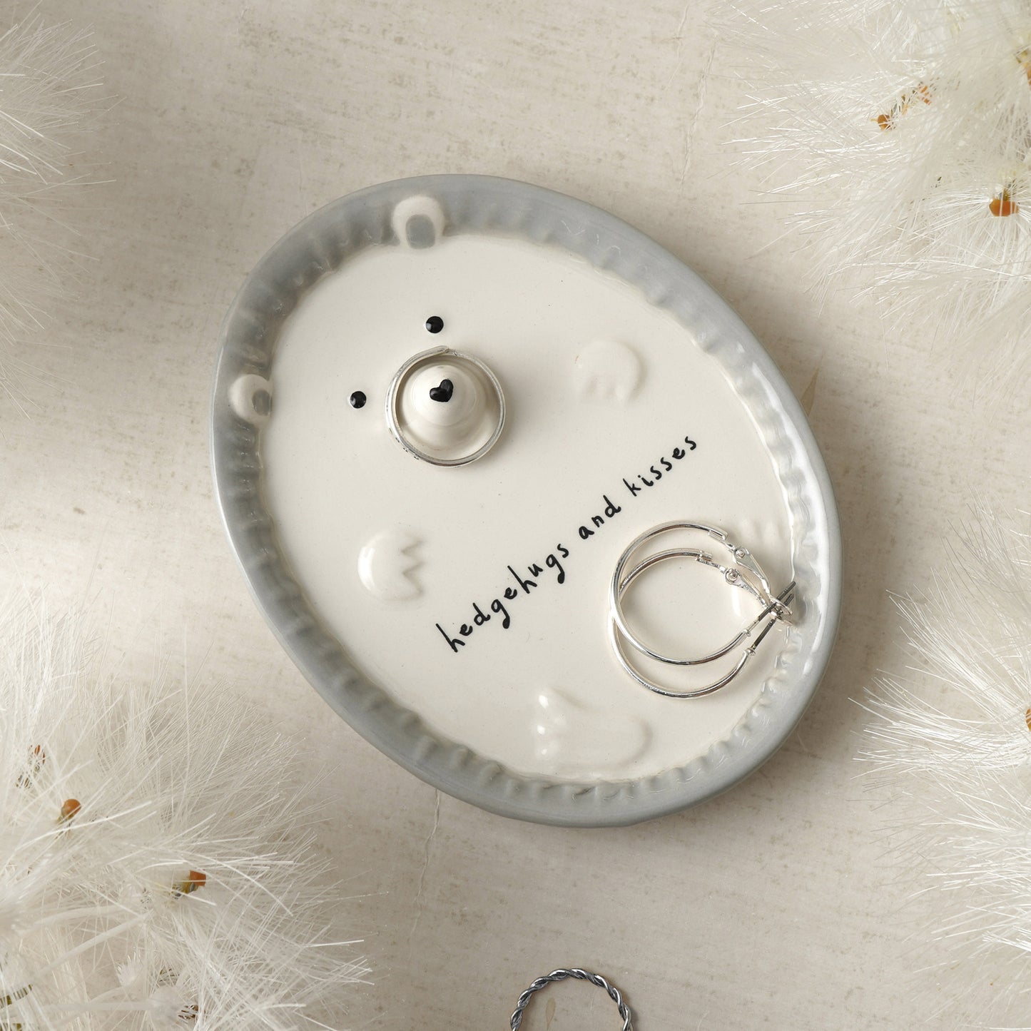 A little ceramic hedgehog jewellery dish that says 'hedgehugs and kisses' lifestyle