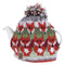 A knitted teacosy with a pompom featuring rows of foxes on a teapot