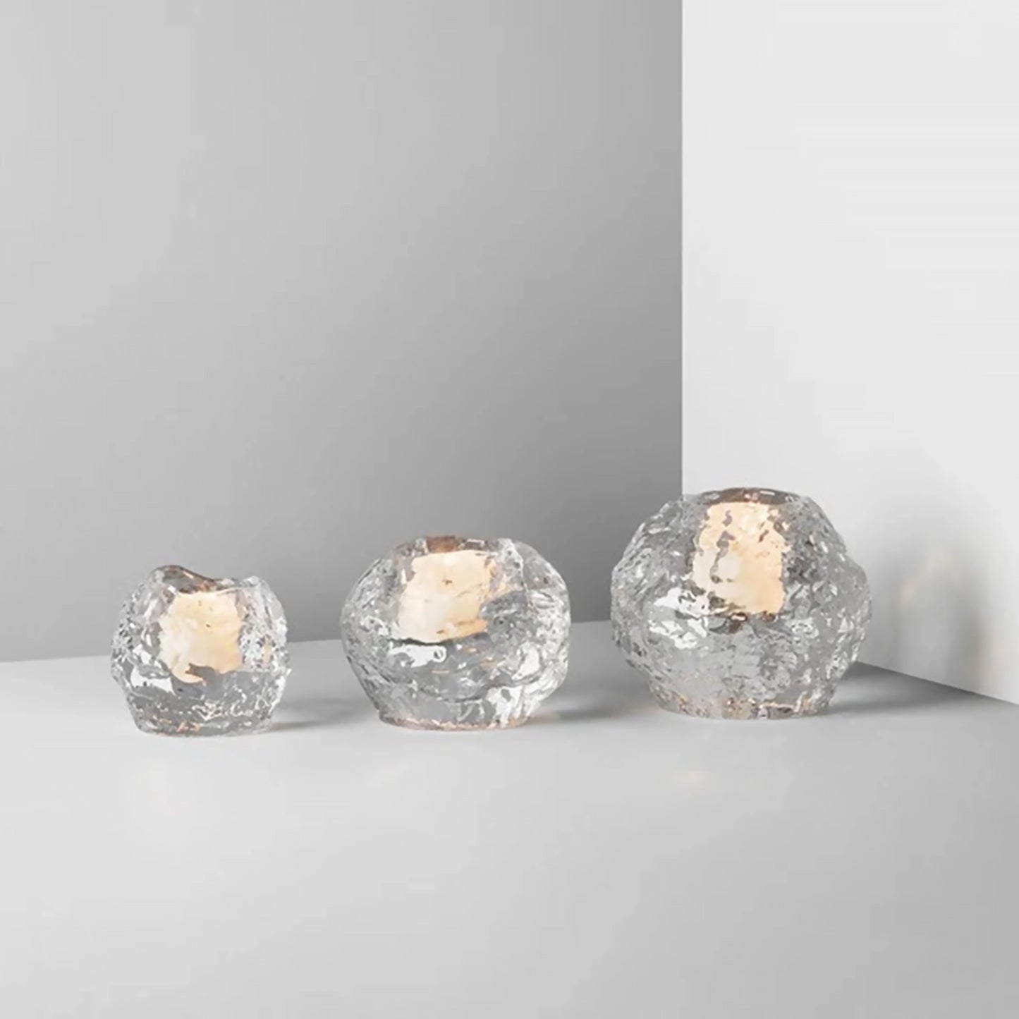 Set of 3 snowballs shaped clear glass votive candle holders with candles