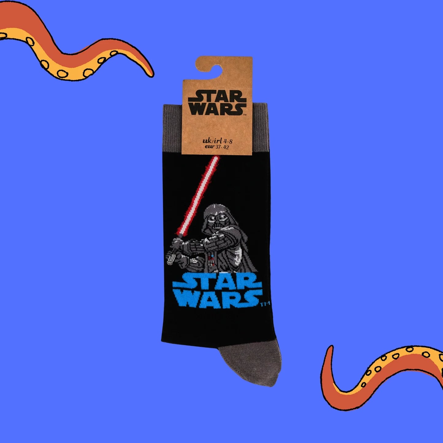 Black and grey Star Wars socks with Darth Vader and cardboard packaging hanger