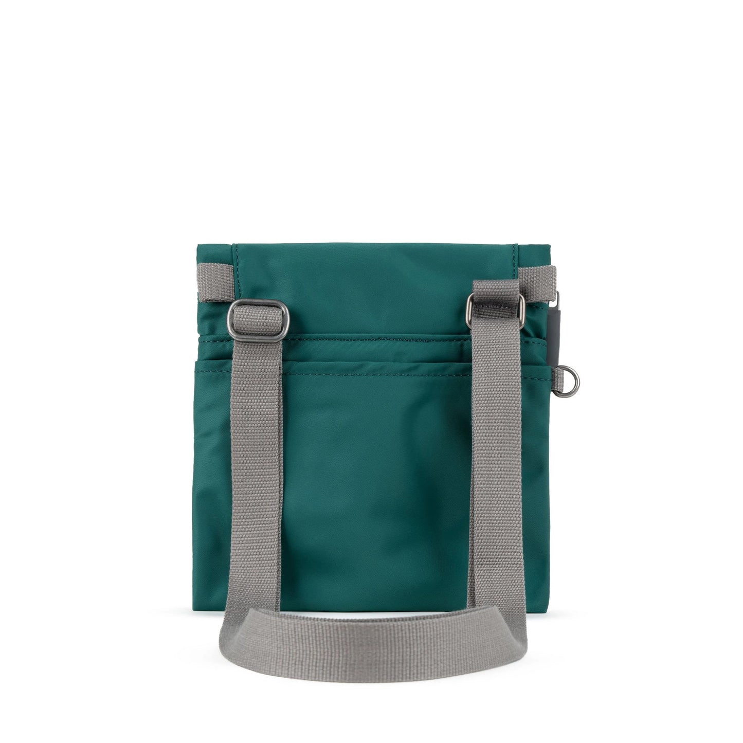Back of square teal nylon bag with grey cotton strap and roll top