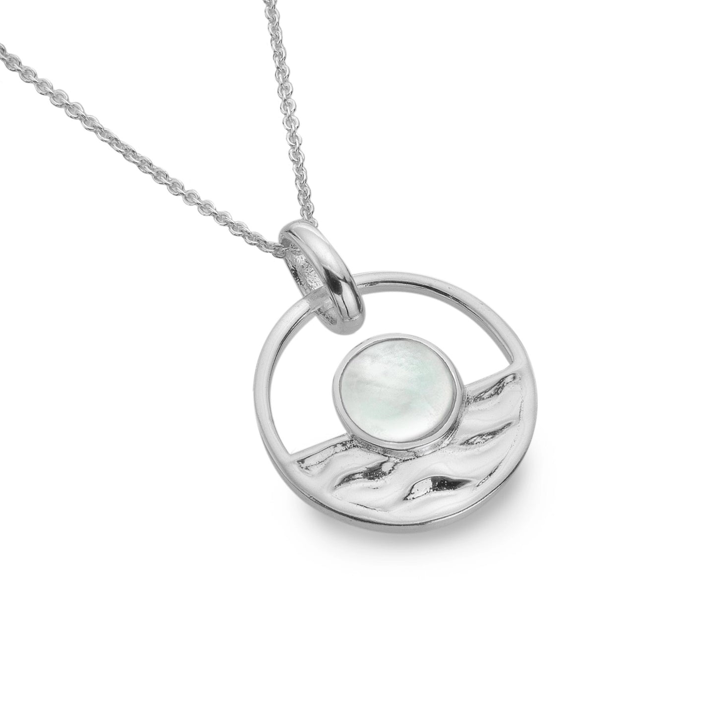 Round pendant with sunset scene, textured silver water and a mother of pearl sun