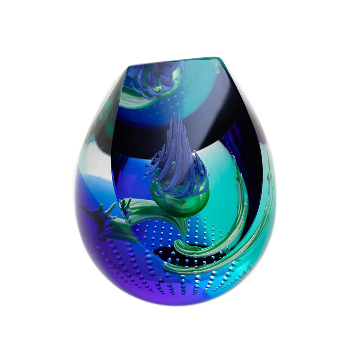 A chisel shaped glass paperweight with swirling purple and blue, a thistle head in the centre, and bubble details mirror