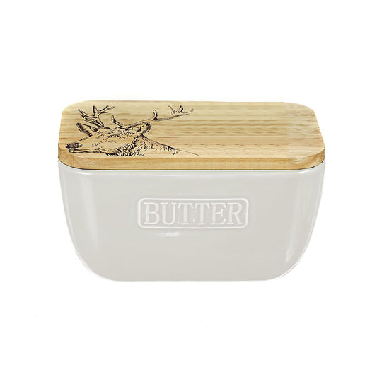 White ceramic butter dish with a wooden lid engraved with a Stag