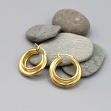 Pair of chunky three layered wire tube hoops with a super polished yellow gold plating