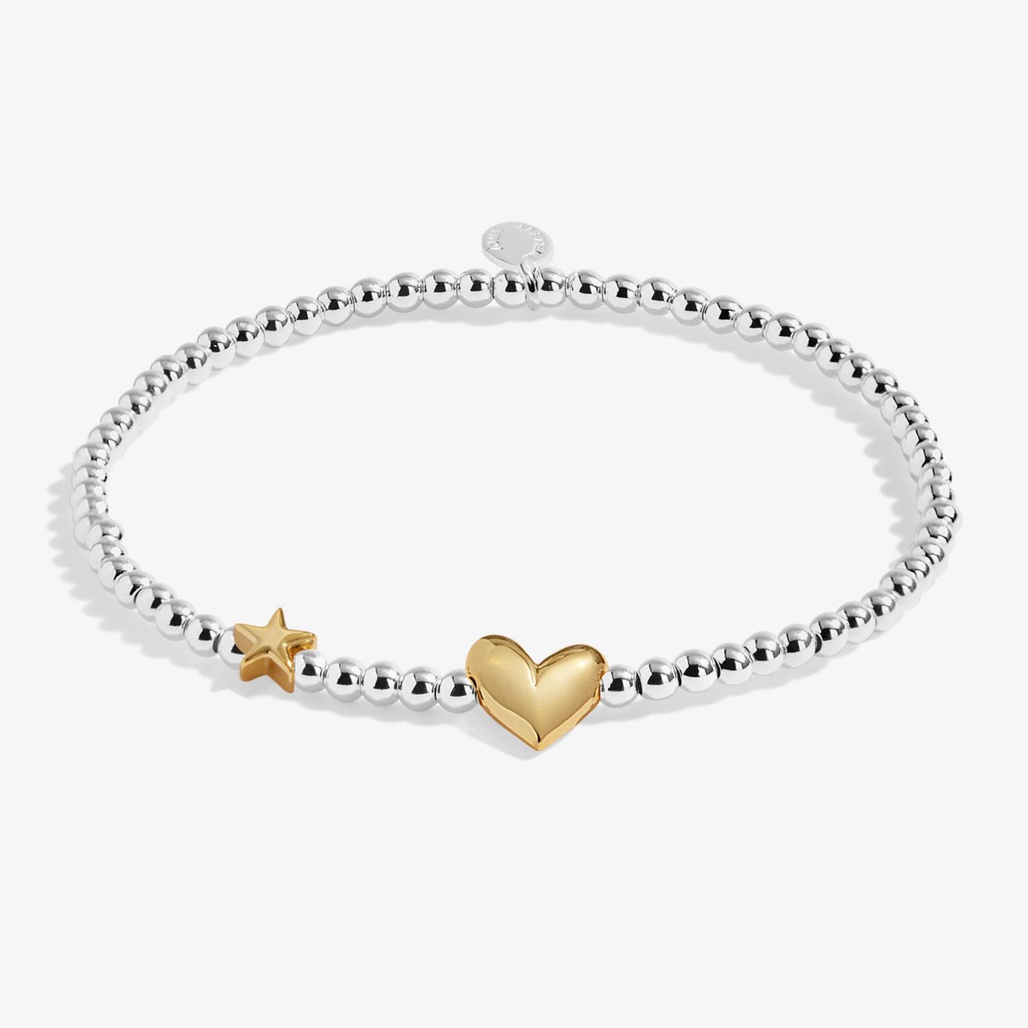 Silver beaded bracelet with a gold heart and star charm