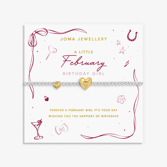 Joma silver beaded birth month bracelet for February with gold heart and flower charms on a sentiment card