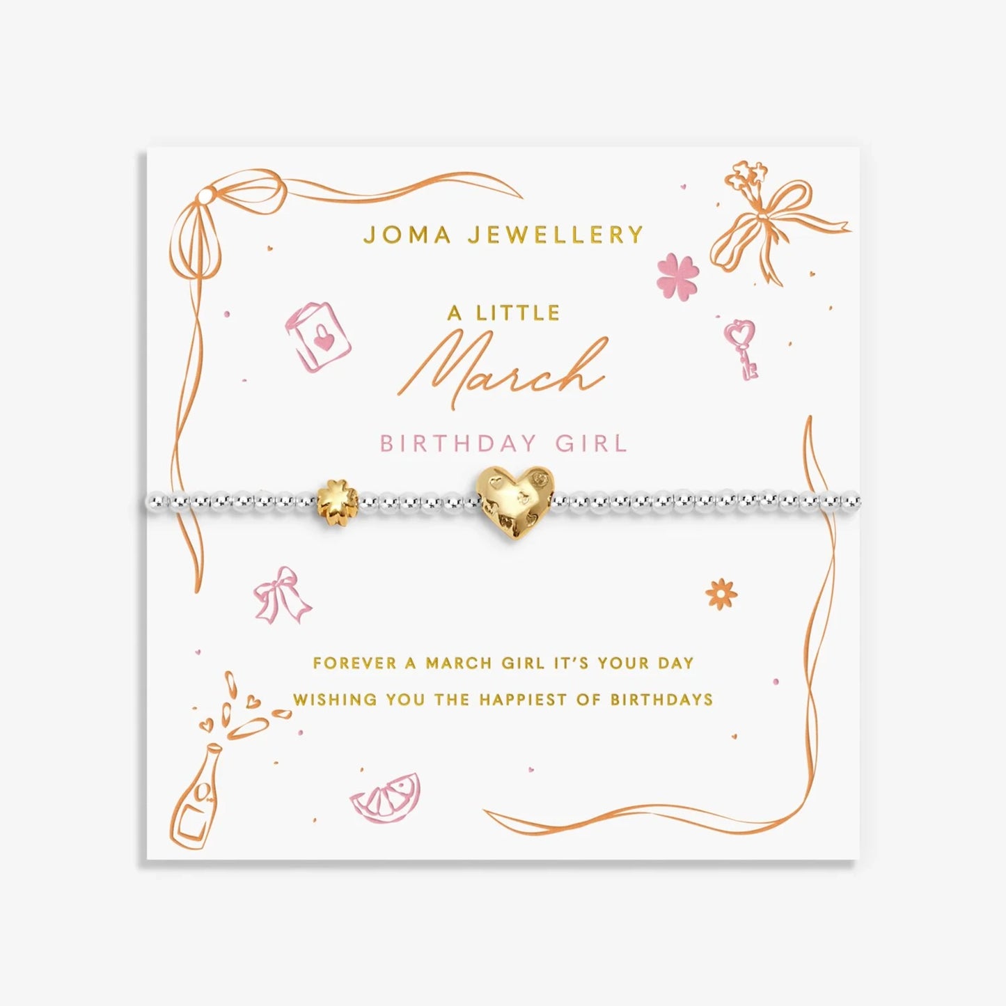 Joma silver beaded birth month bracelet for March with gold heart and clover charms on a sentiment card