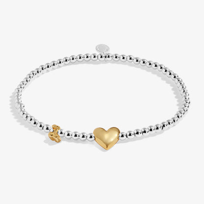 Silver beaded birth month bracelet for May with gold heart and cherry charms 