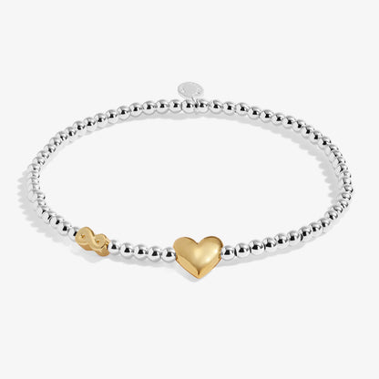 Silver beaded birth month bracelet for September with gold heart and infinity charms