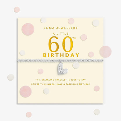 Joma stretch silver bracelet with heart charm on a sentiment card for a 60th birthday 