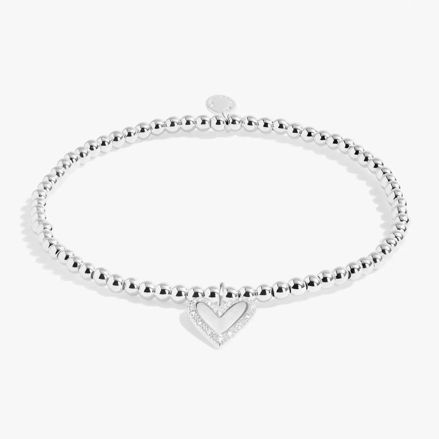 Silver beaded bracelet with heart shaped charm set with CZ stones
