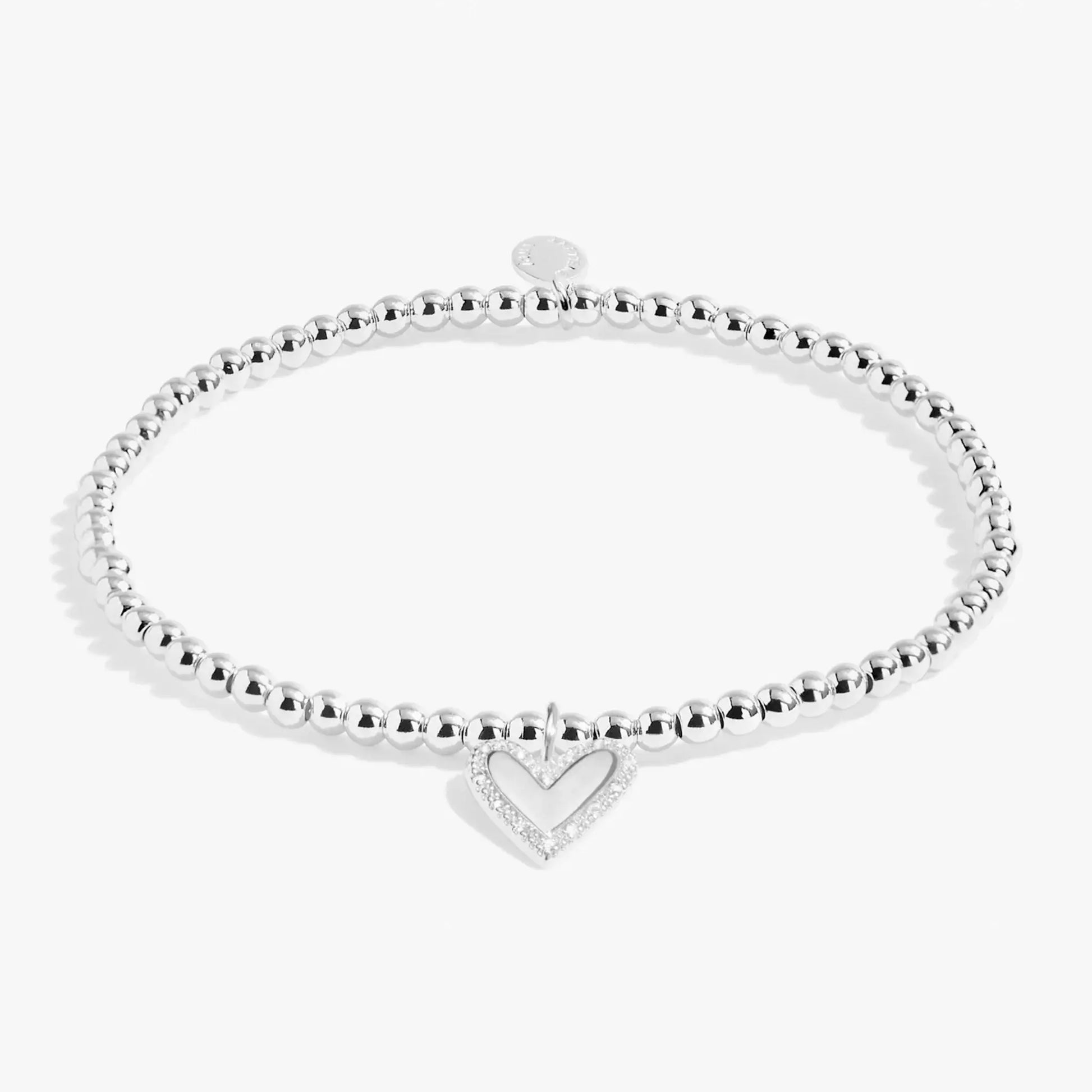 Silver beaded bracelet with heart shaped charm set with CZ stones